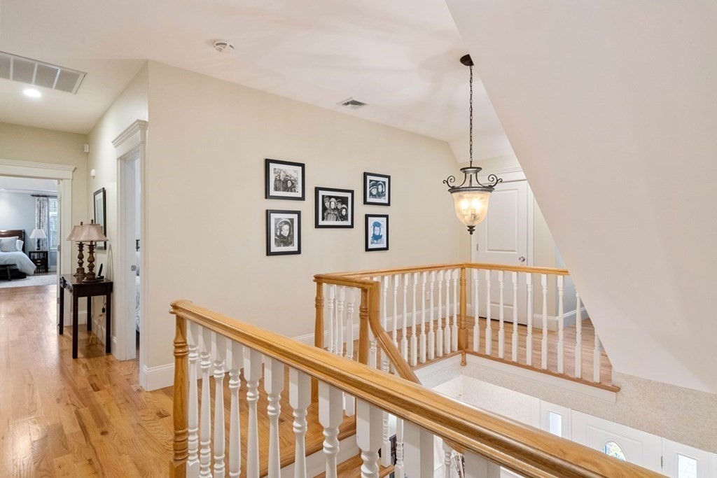 81 Pine Street Dover, MA 02030 - Photo 30 of 40 a view of a hallway with a livingroom