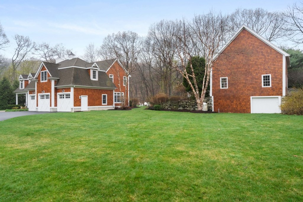 81 Pine Street Dover, MA 02030 - Photo 40 of 40 a front view of house with yard and green space