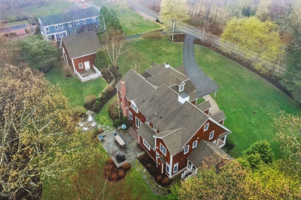 81 Pine Street Dover, MA 02030 - Photo 5 of 40 an aerial view of a house with a big yard