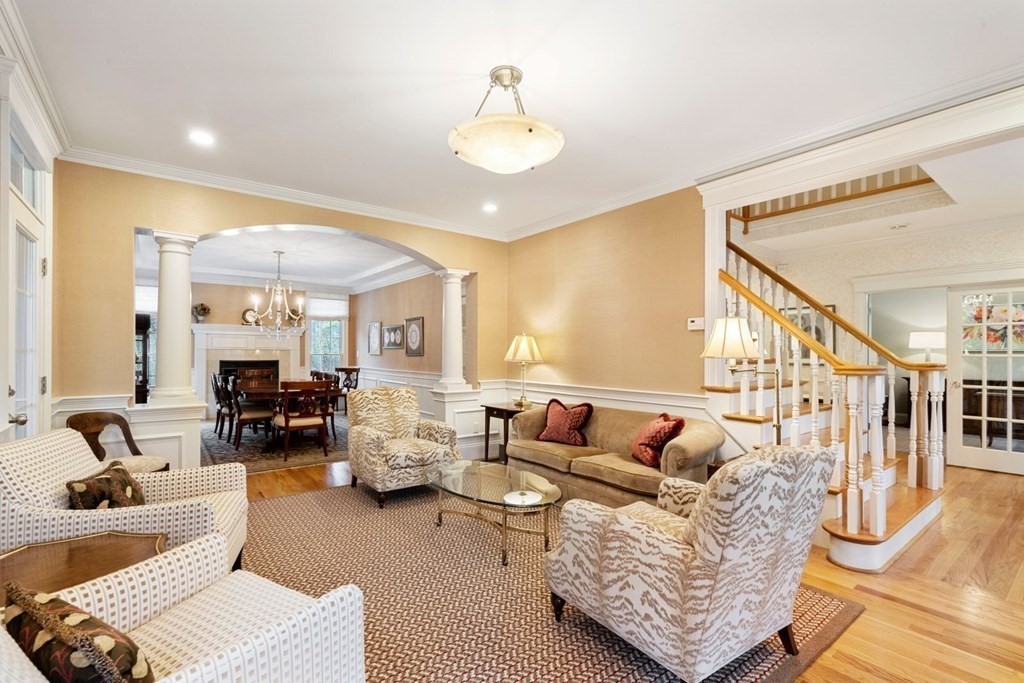 81 Pine Street Dover, MA 02030 - Photo 7 of 40 a living room with furniture fireplace and a chandelier