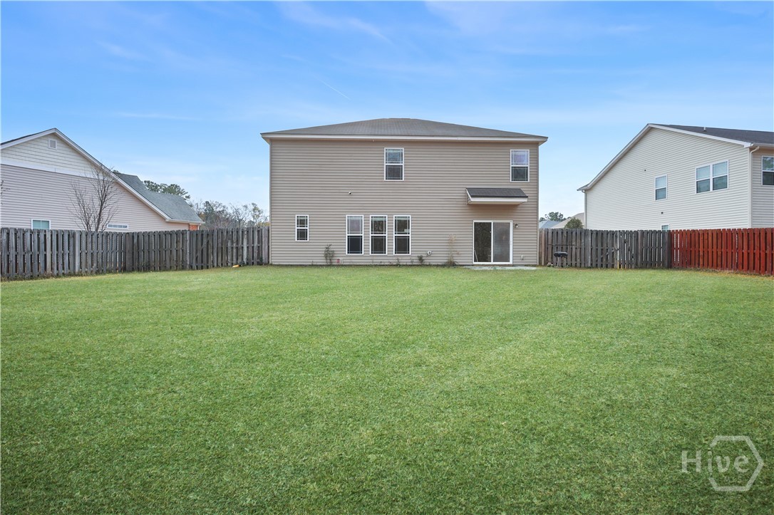 168 Magnolia Drive Pooler, GA 31322 - Photo 47 of 52 Mostly fenced backyard with enhanced digital grass.
