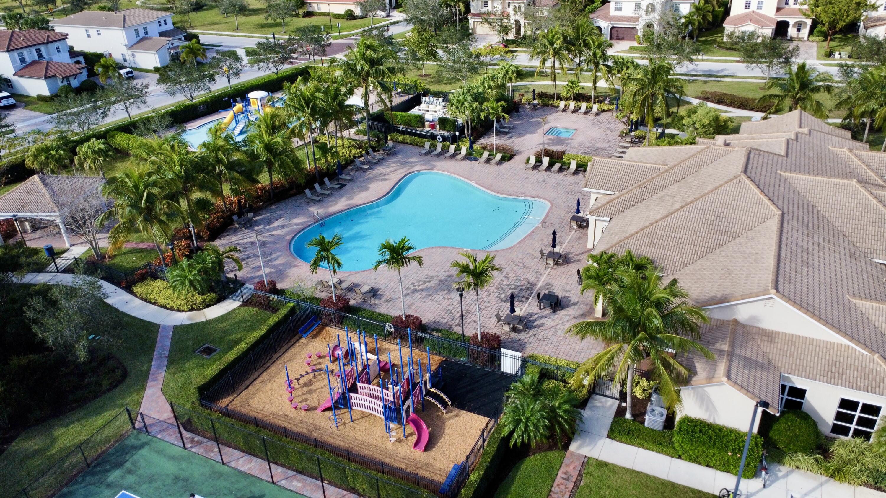 168 Umbrella Place Jupiter, FL 33458 - Photo 14 of 23 an aerial view of a residential houses with outdoor space and street view