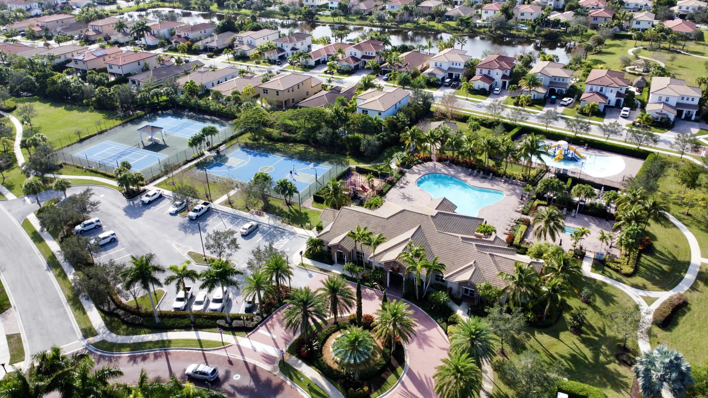 168 Umbrella Place Jupiter, FL 33458 - Photo 21 of 23 an aerial view of lake and residential houses with outdoor space