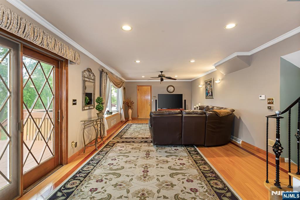 16 Barbara Way Wayne, NJ 07470 - Photo 13 of 35 a living room with furniture and a flat screen tv