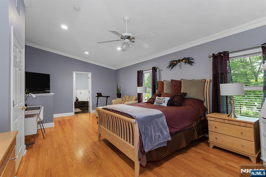 16 Barbara Way Wayne, NJ 07470 - Photo 16 of 35 a bedroom with a bed and a flat screen tv