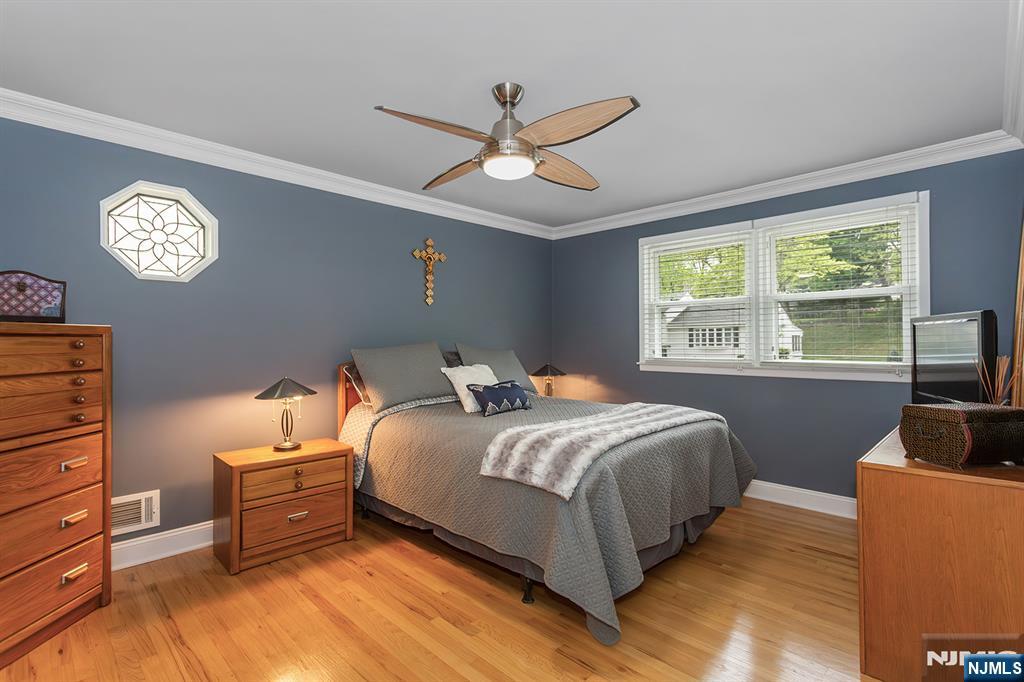 16 Barbara Way Wayne, NJ 07470 - Photo 21 of 35 a bed room with a bed and a window