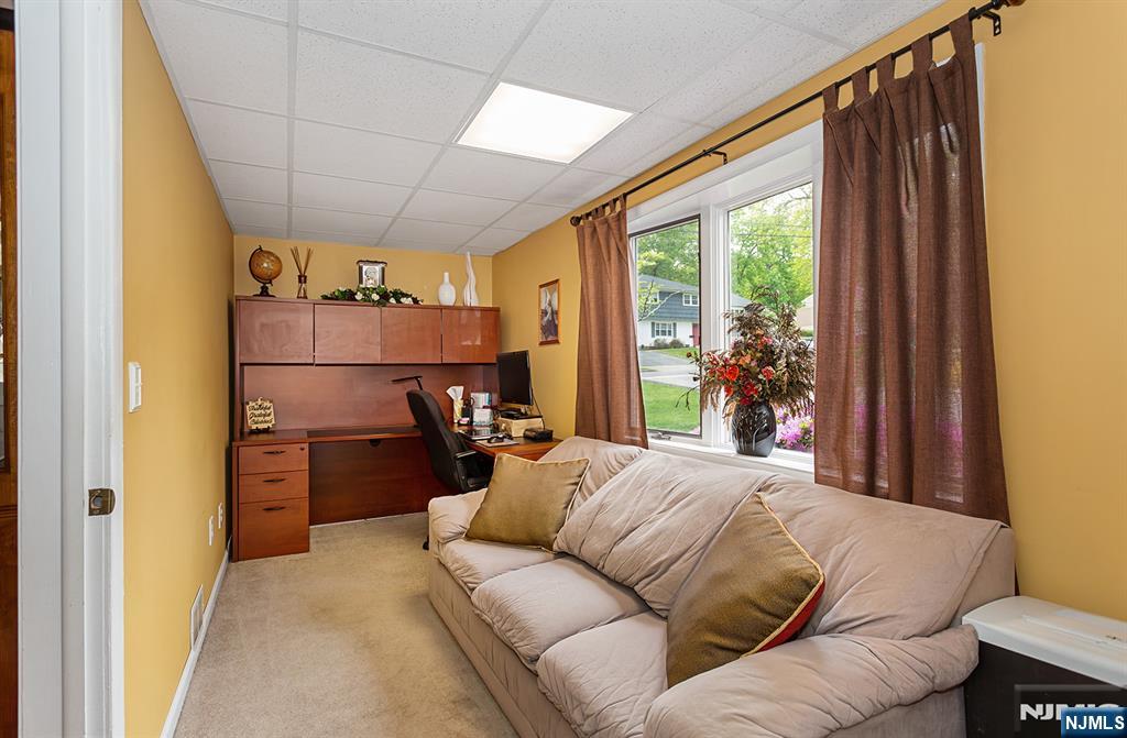 16 Barbara Way Wayne, NJ 07470 - Photo 28 of 35 a bed room with a bed and a refrigerator