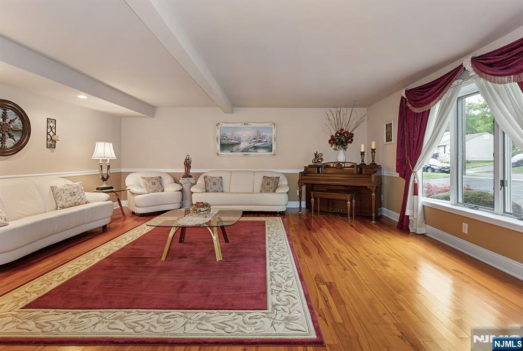 16 Barbara Way Wayne, NJ 07470 - Photo 5 of 35 a living room with furniture and a large window