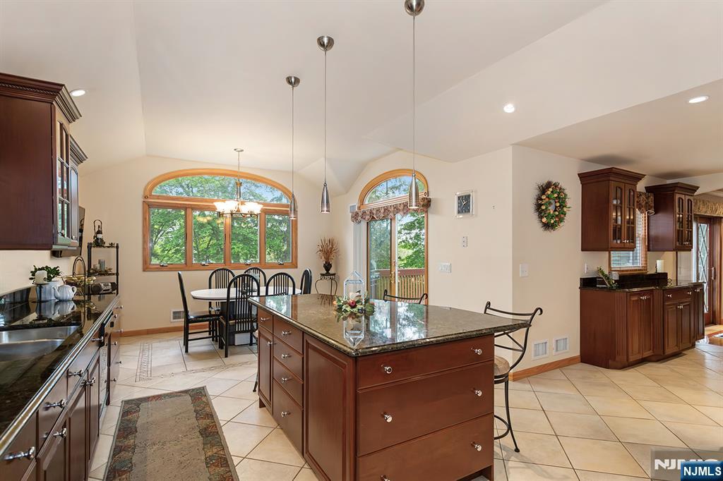 16 Barbara Way Wayne, NJ 07470 - Photo 8 of 35 a view of living room and kitchen with a large window