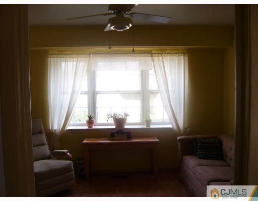 26 Johnson Road Somerset, NJ 08873 - Photo 5 of 9 a living room with furniture and a window