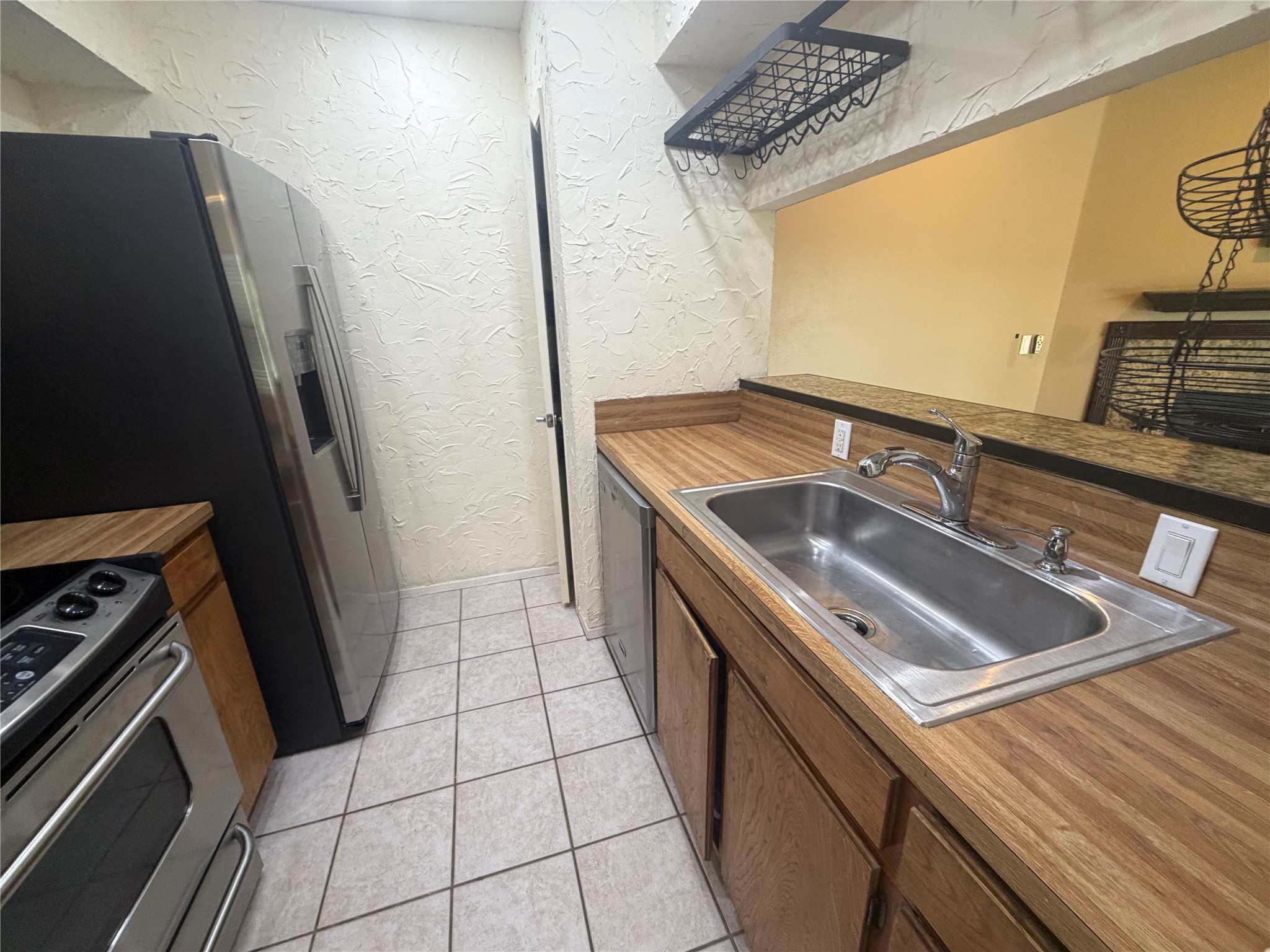 3744 Valley View Road, Unit C Austin, TX 78704 - Photo 8 of 25 a kitchen with a sink stove and refrigerator