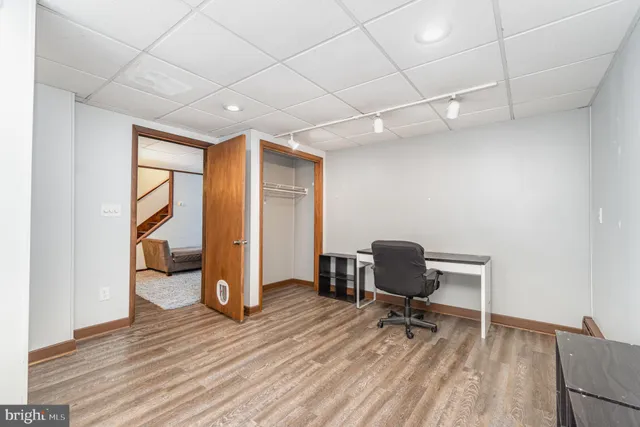 a bathroom with a toilet a sink and bathtub