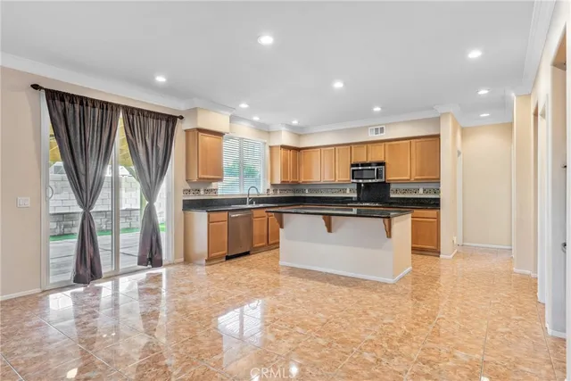 a bedroom with a bed and a potted plant