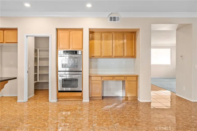 a bathroom with a granite countertop sink mirror toilet and bathtub