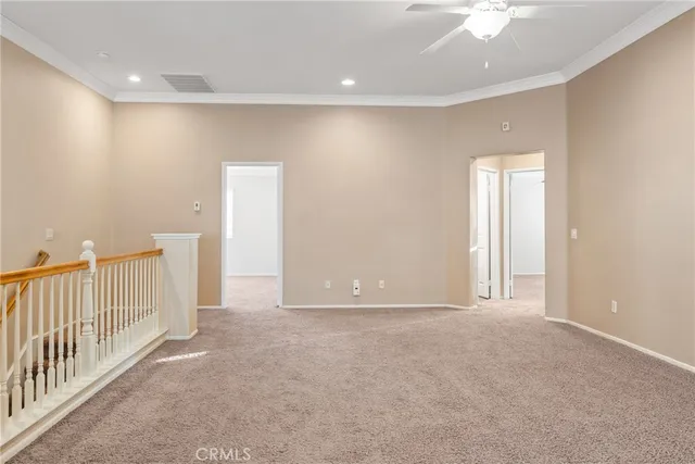 a kitchen with granite countertop a refrigerator and a sink