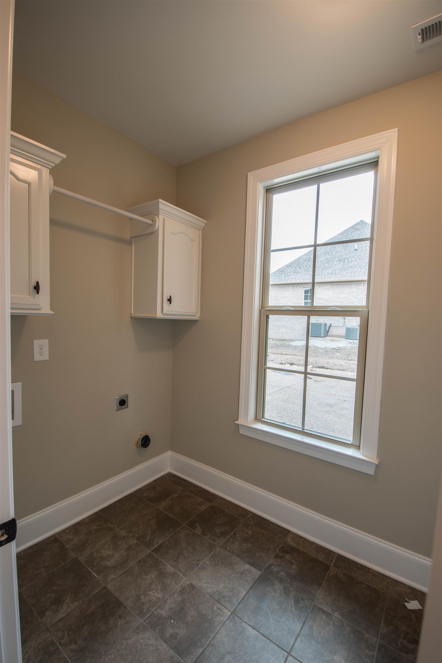 1345 Center Point Road Hendersonville, TN 37075 - Photo 17 of 27 an empty room with a window