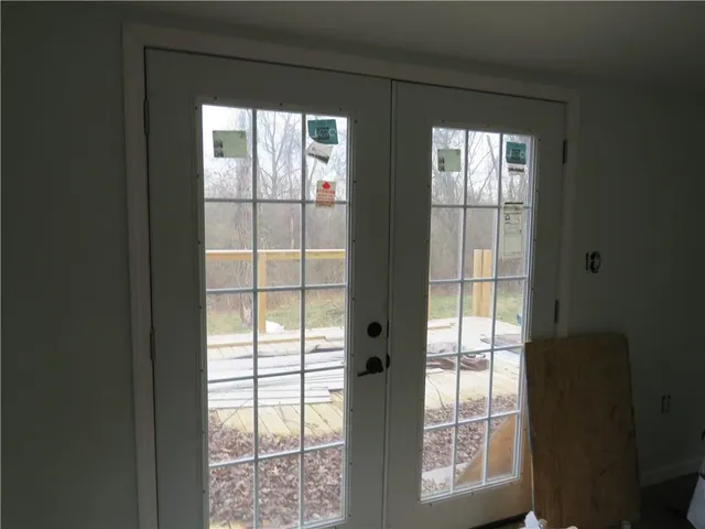 a view of an empty room and window