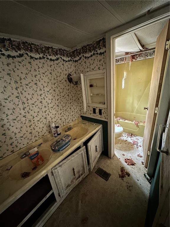 240-246 Harmony Drive Flinton, PA 16640 - Photo 10 of 13 a bathroom with a bathtub and shower