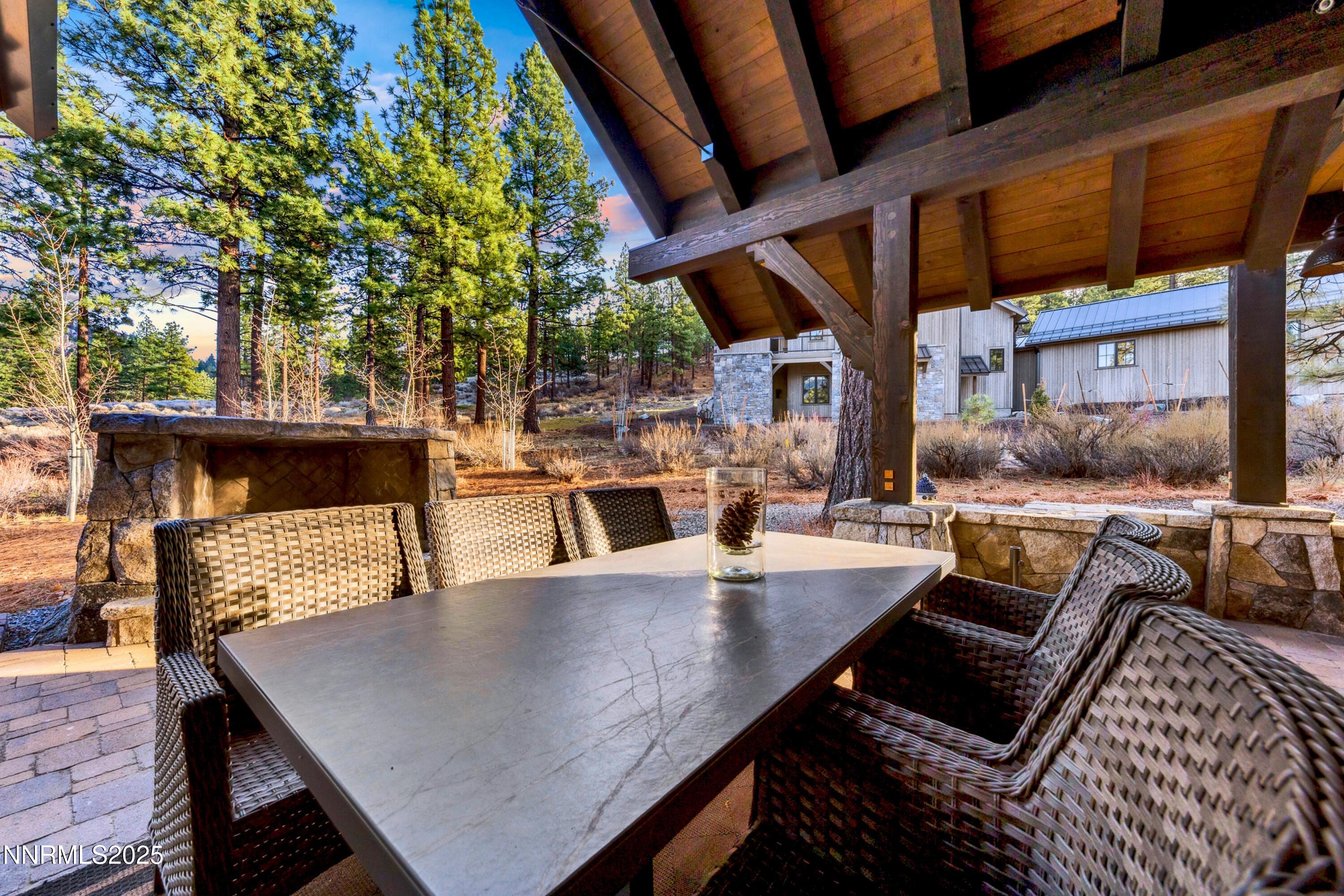 261 Redding Way Carson City, NV 89705 - Photo 68 of 90 a view of a patio with a table and chairs