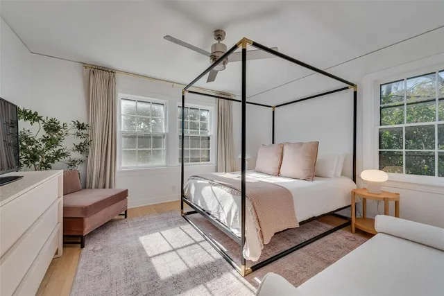 a bed room with a bed and a couch