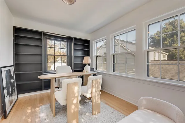 a view of a dining room with furniture window and outside view