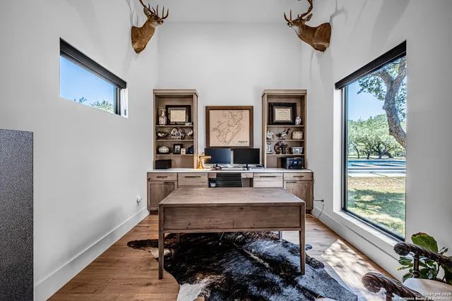 a view of a livingroom with furniture and window