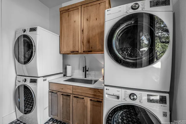 a utility room with dryer and washer