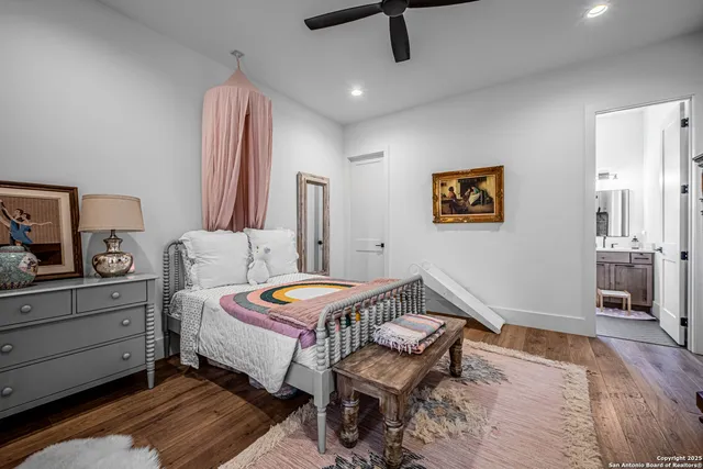 a bedroom with a bed and furniture