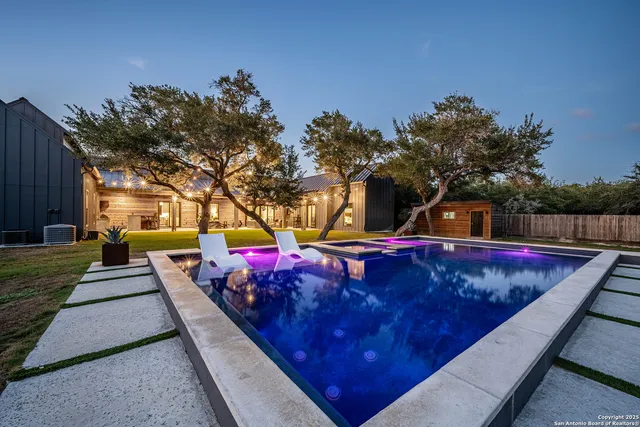 a view of a swimming pool with a patio