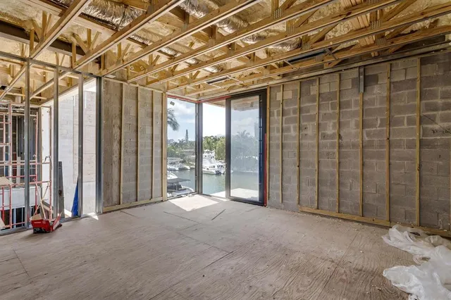 a view of a room with wooden walls