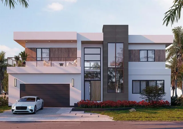 a front view of a house with a garden