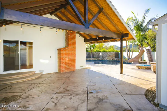a view of a backyard of a house