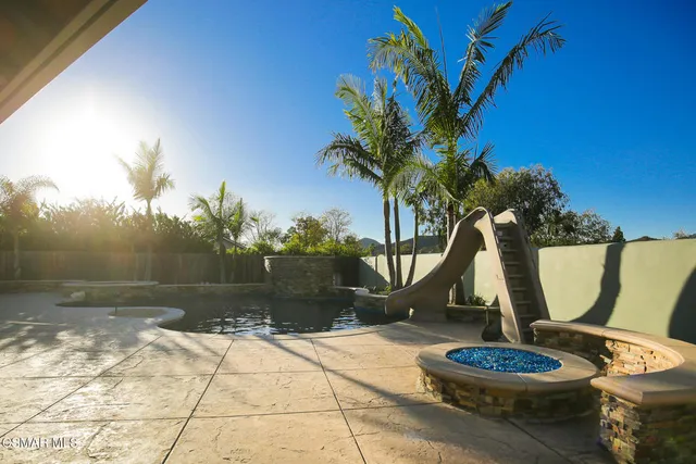 a vase of flowers sitting on a table