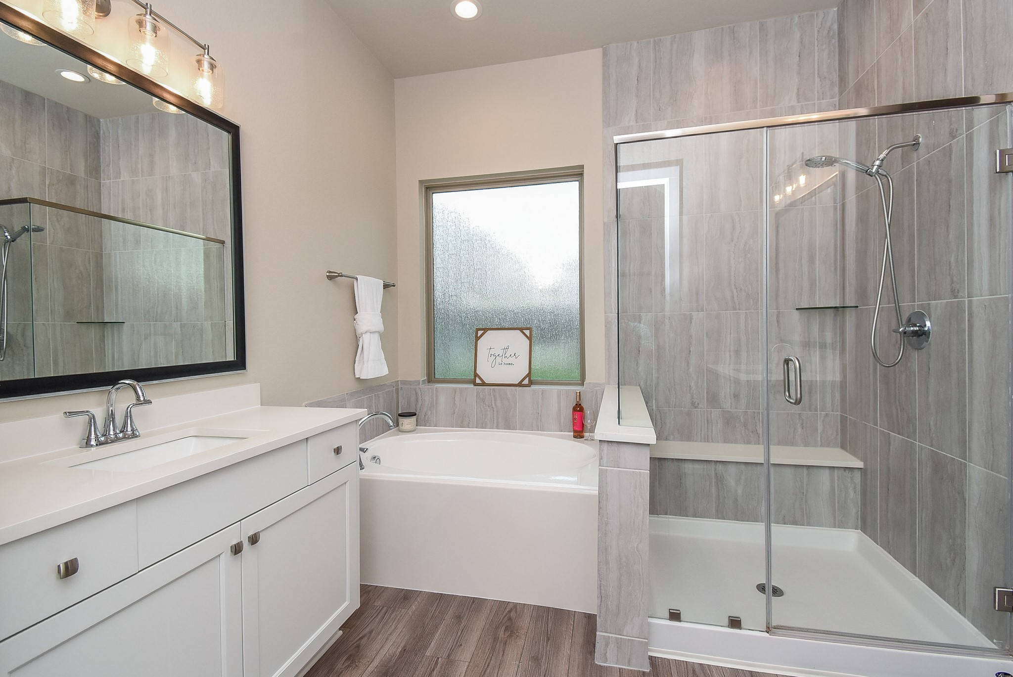7322 Perching Hawk Trail Katy, TX 77493 - Photo 15 of 38 a bathroom with a sink and a mirror