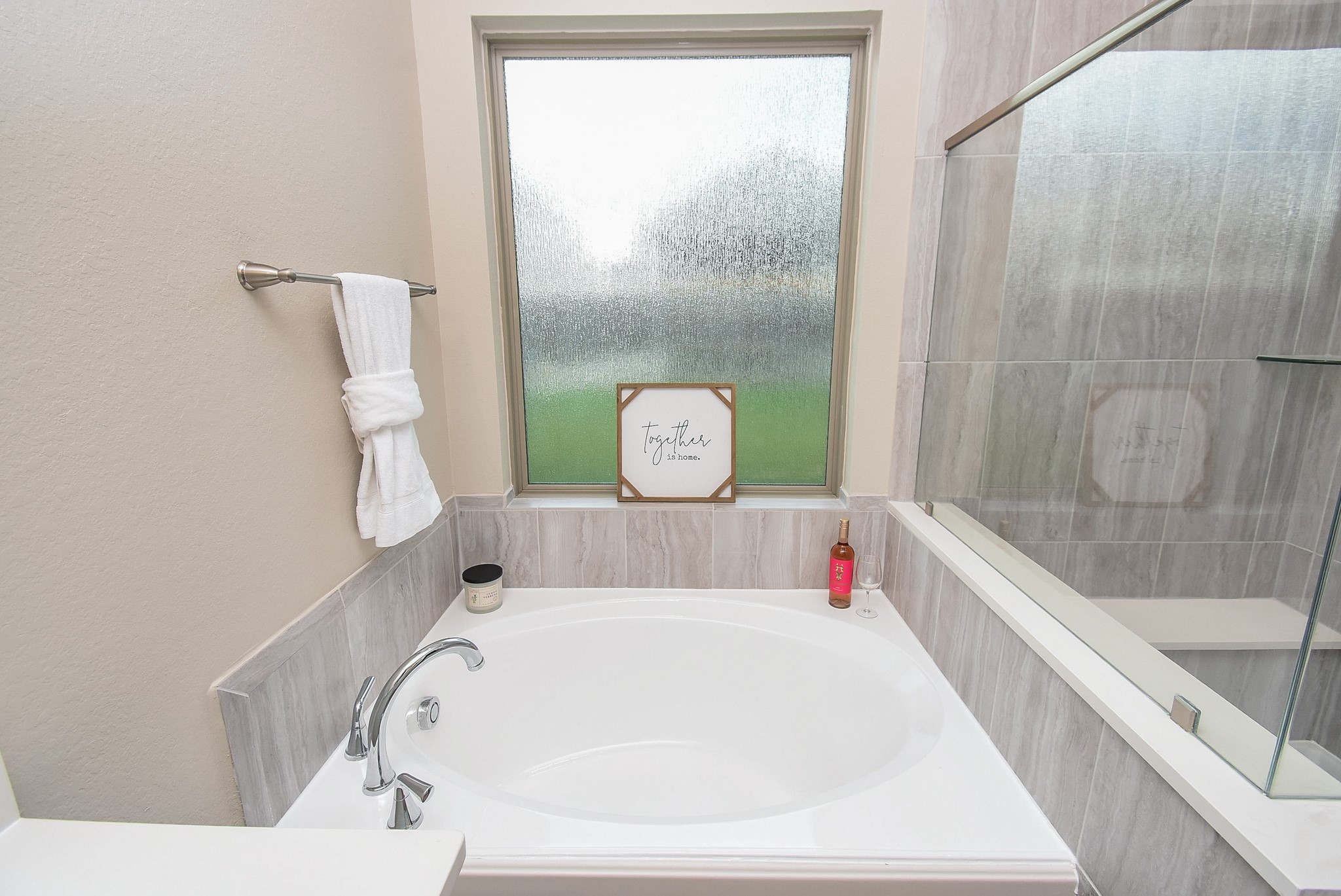 7322 Perching Hawk Trail Katy, TX 77493 - Photo 16 of 38 a bathroom with a bathtub and a shower