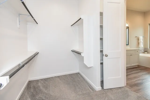 a view of a hallway with white walls
