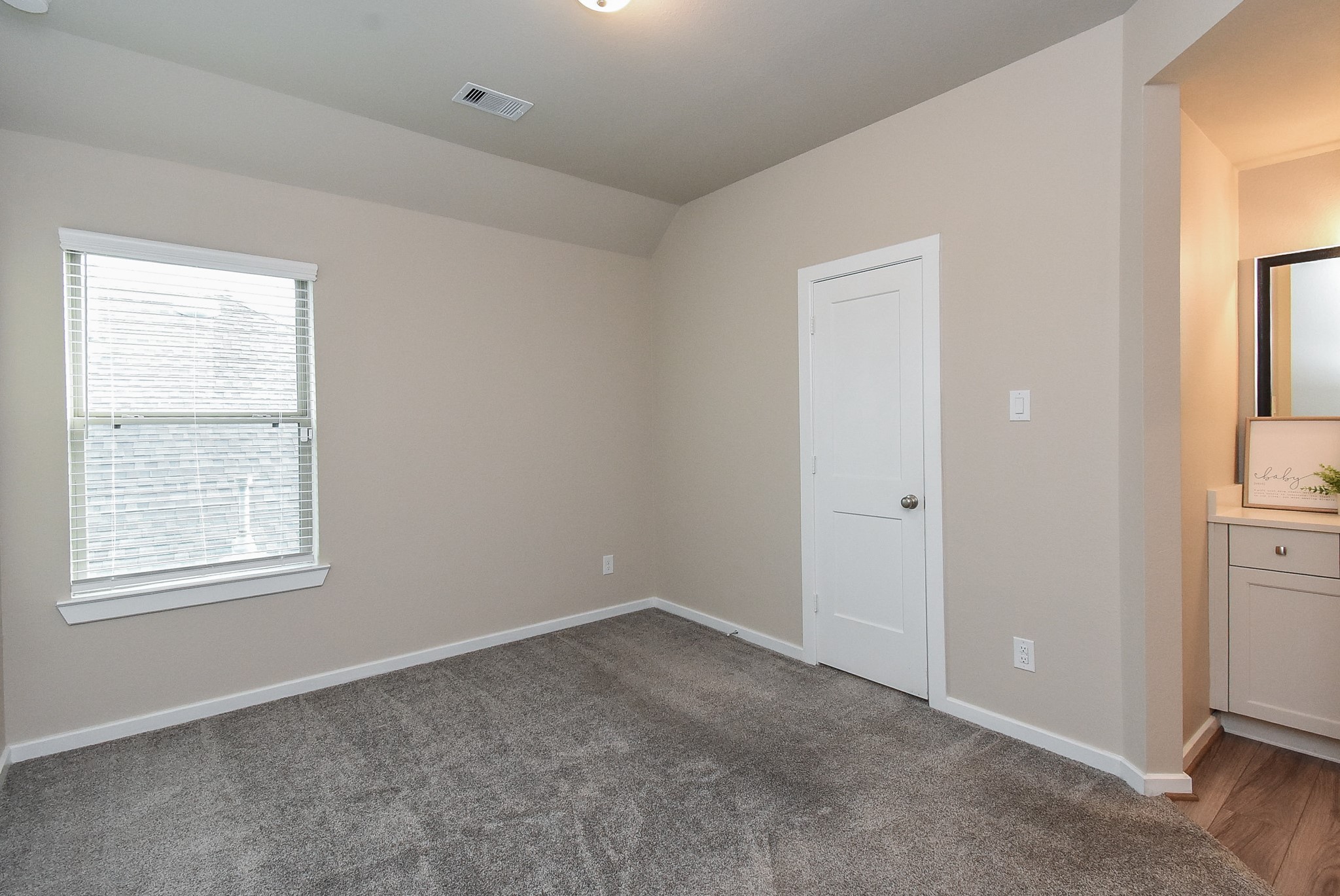 7322 Perching Hawk Trail Katy, TX 77493 - Photo 23 of 38 an empty room with windows and closet