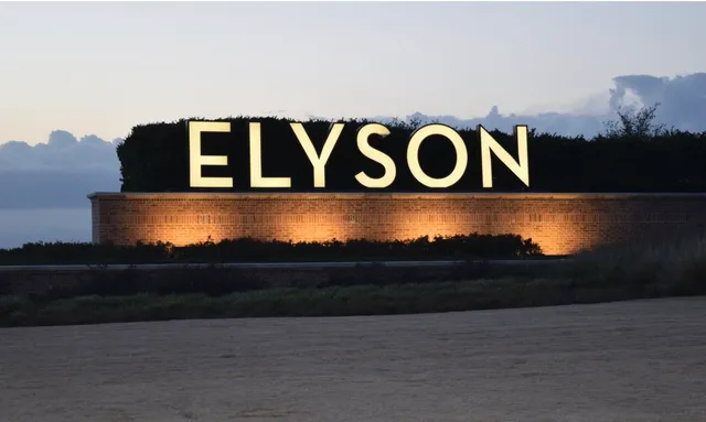 a view of a gym with lots of tables and chairs