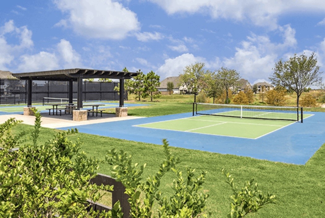 7322 Perching Hawk Trail Katy, TX 77493 - Photo 36 of 38 a view of yard with swimming pool and green space