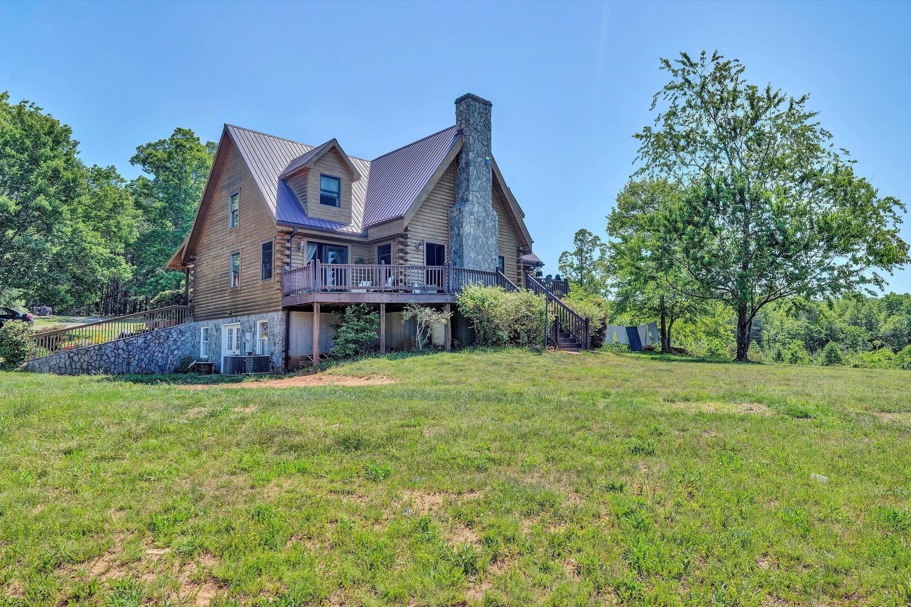180 Thompson Ridge Circle Ferrum, VA 24088 - Photo 4 of 74 front view of a house with a big yard