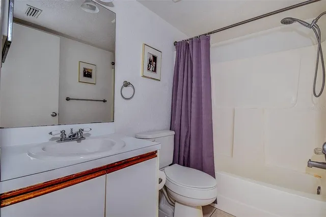 a view of a street view from a balcony