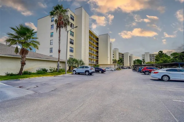 a view of swimming pool with outdoor seating