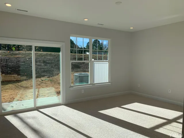 a view of a room with a large window