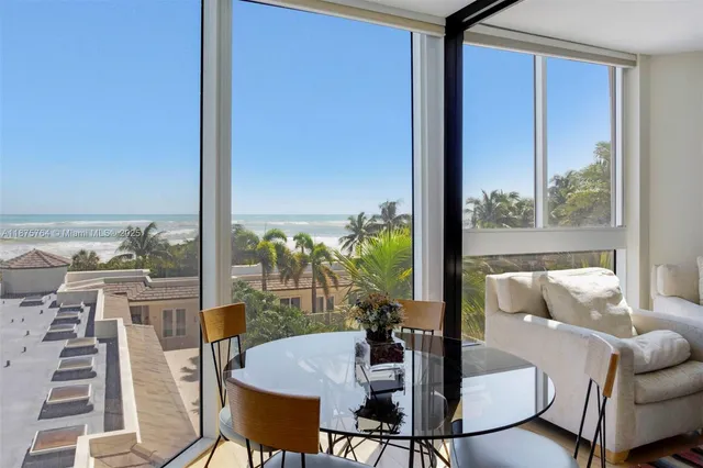 a front view of a building with small garden