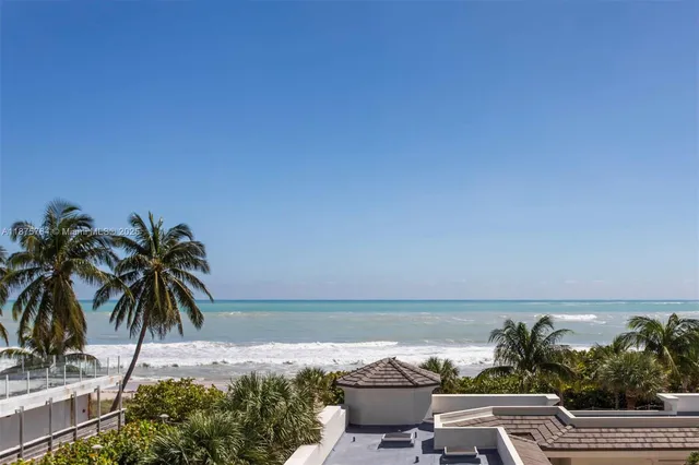 a kitchen with a table chairs stove and kitchen view