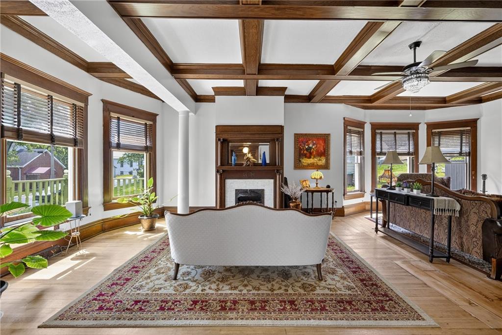 24 Shady Avenue Burgettstown, PA 15021 - Photo 11 of 50 Wood beams, gleaming hardwoods and decorative fireplace.