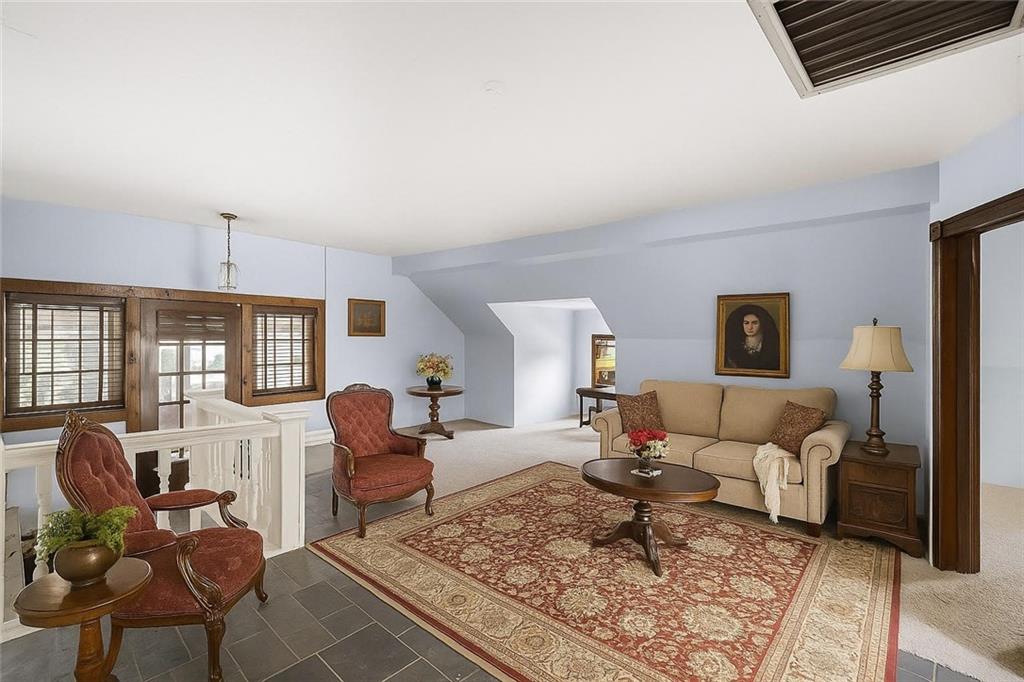 24 Shady Avenue Burgettstown, PA 15021 - Photo 36 of 50 3rd level apartment living room, virtually staged.