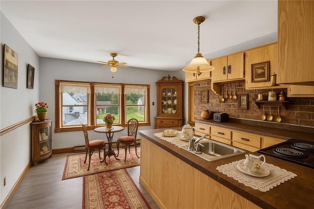24 Shady Avenue Burgettstown, PA 15021 - Photo 44 of 50 Virtually staged apartment kitchen.