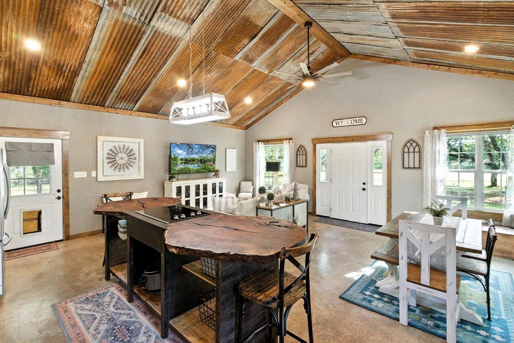 11140 Light Road Lipan, TX 76462 - Photo 11 of 37 a view of a dining room with furniture