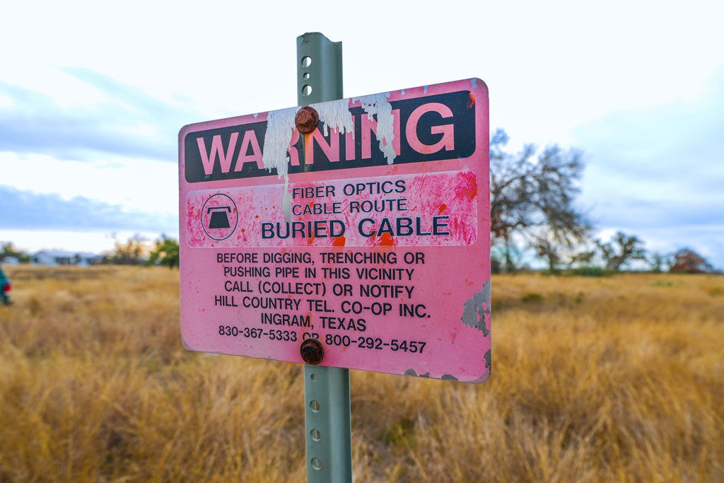 875 Old Harper Road Harper, TX 78631 - Photo 40 of 42 a sign on the side of a building